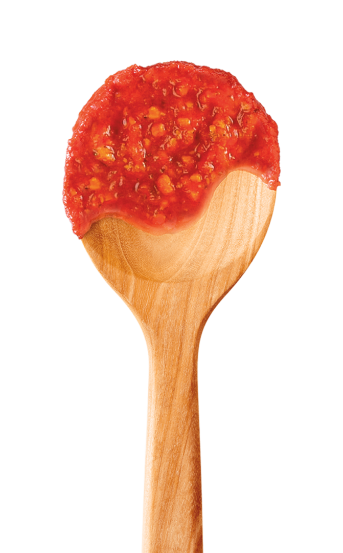 spoon with red pepper pesto